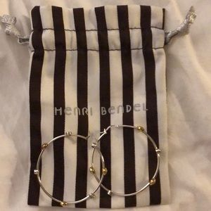 Henri Bender Silver and gold hoops.